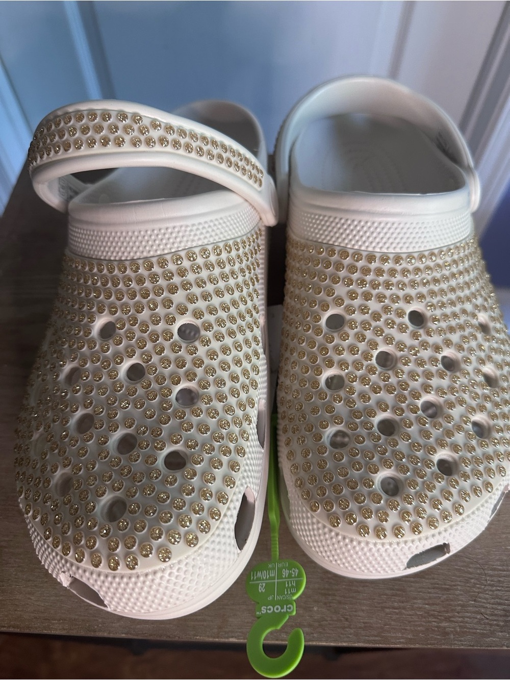 CROCS White Slip-On Clogs with Gold Studs